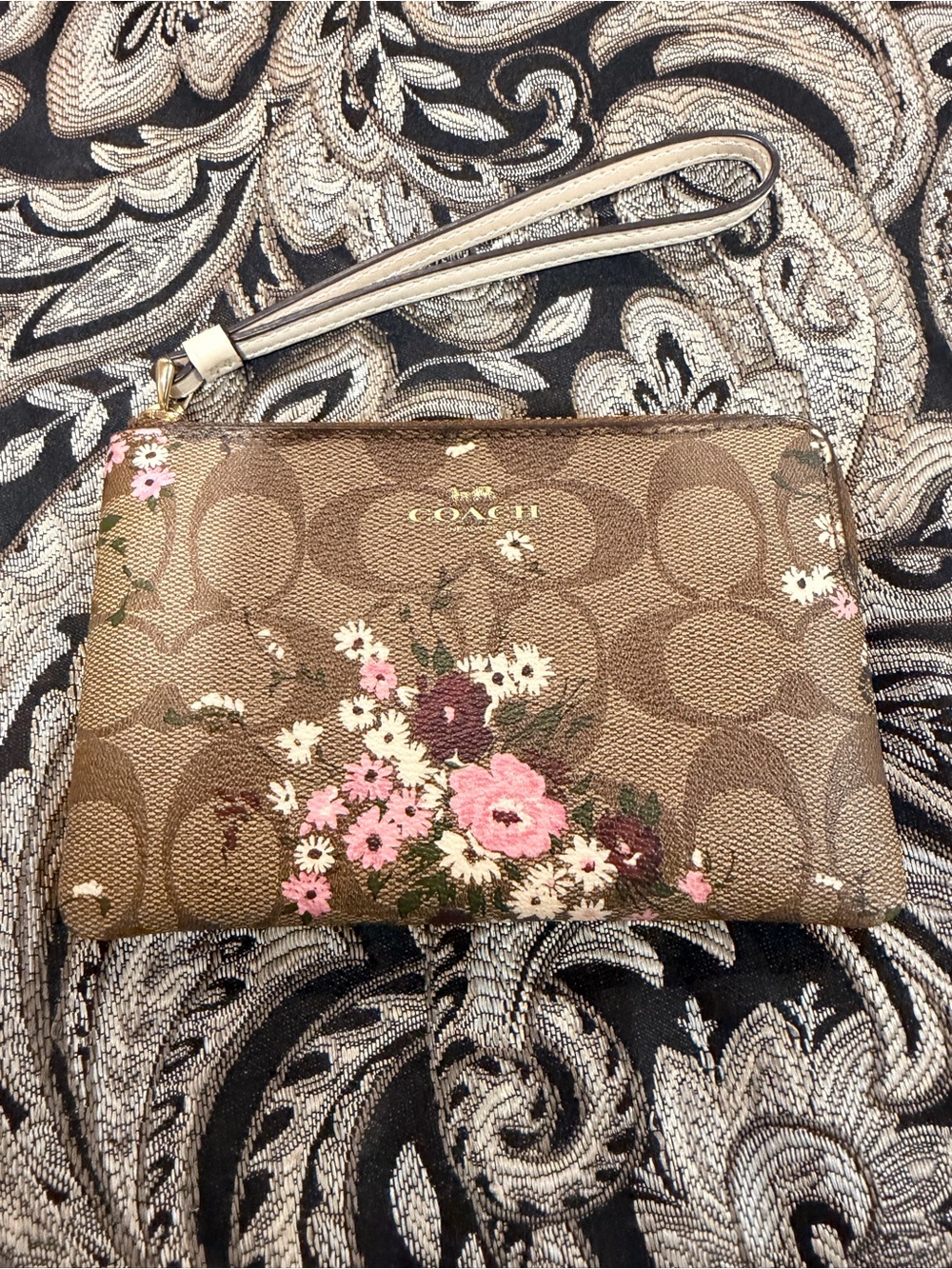 Coach Brown Signature Floral Wristlet with Pink and Cream Flowers